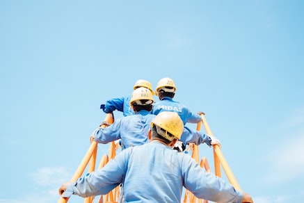 zachry construction workers walking up stairs