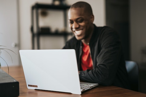 person accessing walmart paystub online