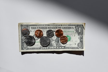 USD denominations on white table