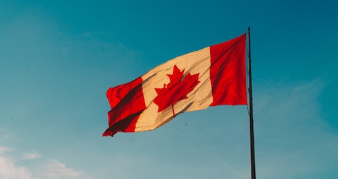 canadian flag blowing in the wind